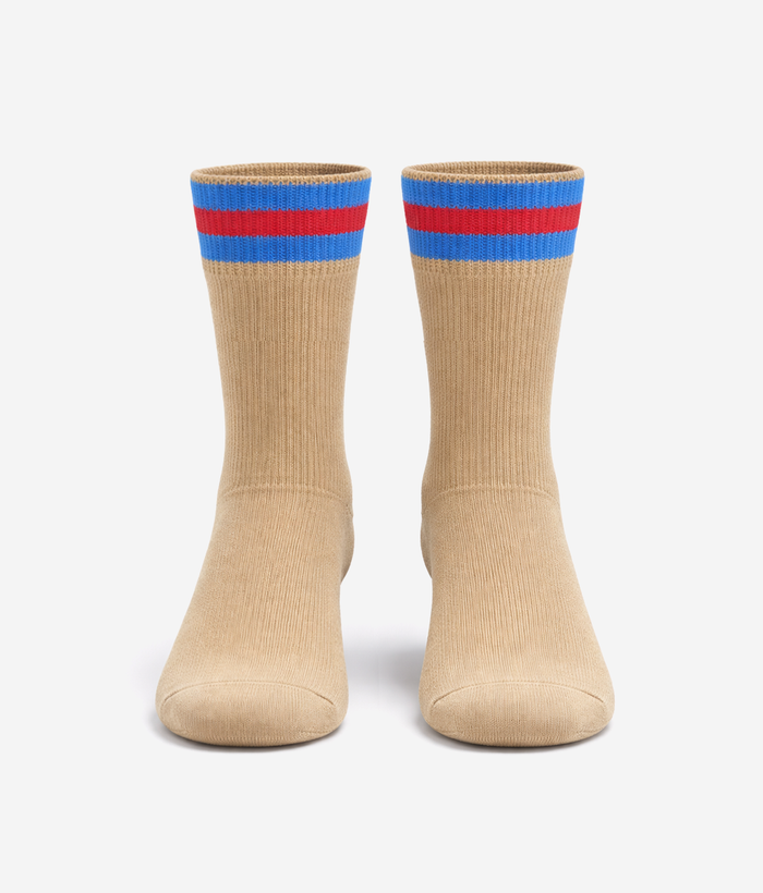 The Knowledge Habitat School beige uniform socks with red and blue stripes, pair shown front view — KOTU
