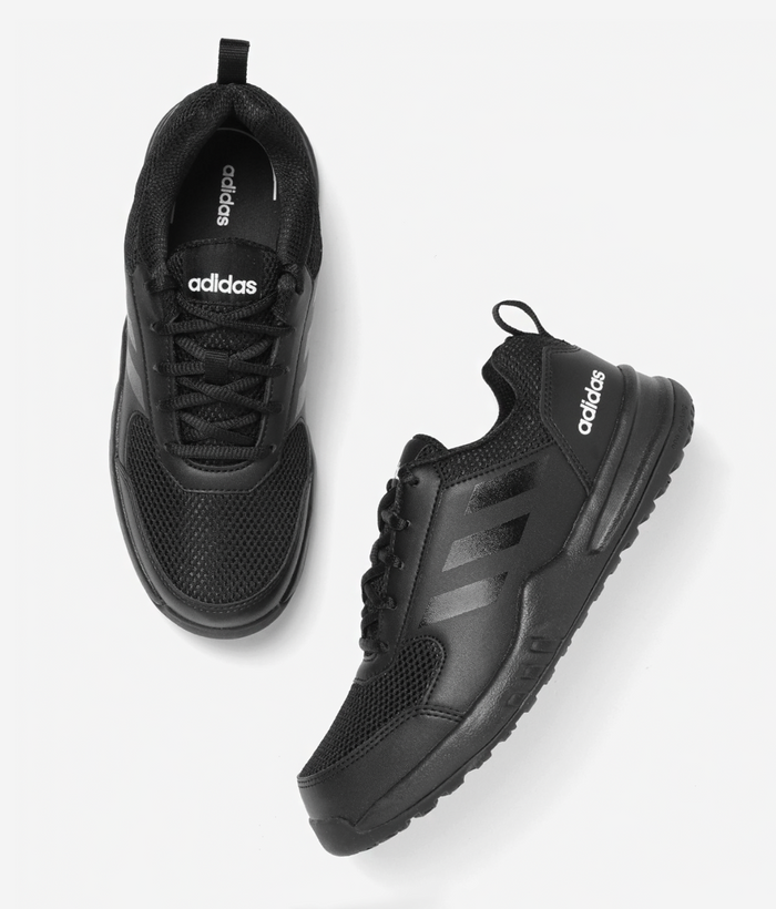 Adidas black school shoes with lace-up closure, pair shown top and side view — KOTU